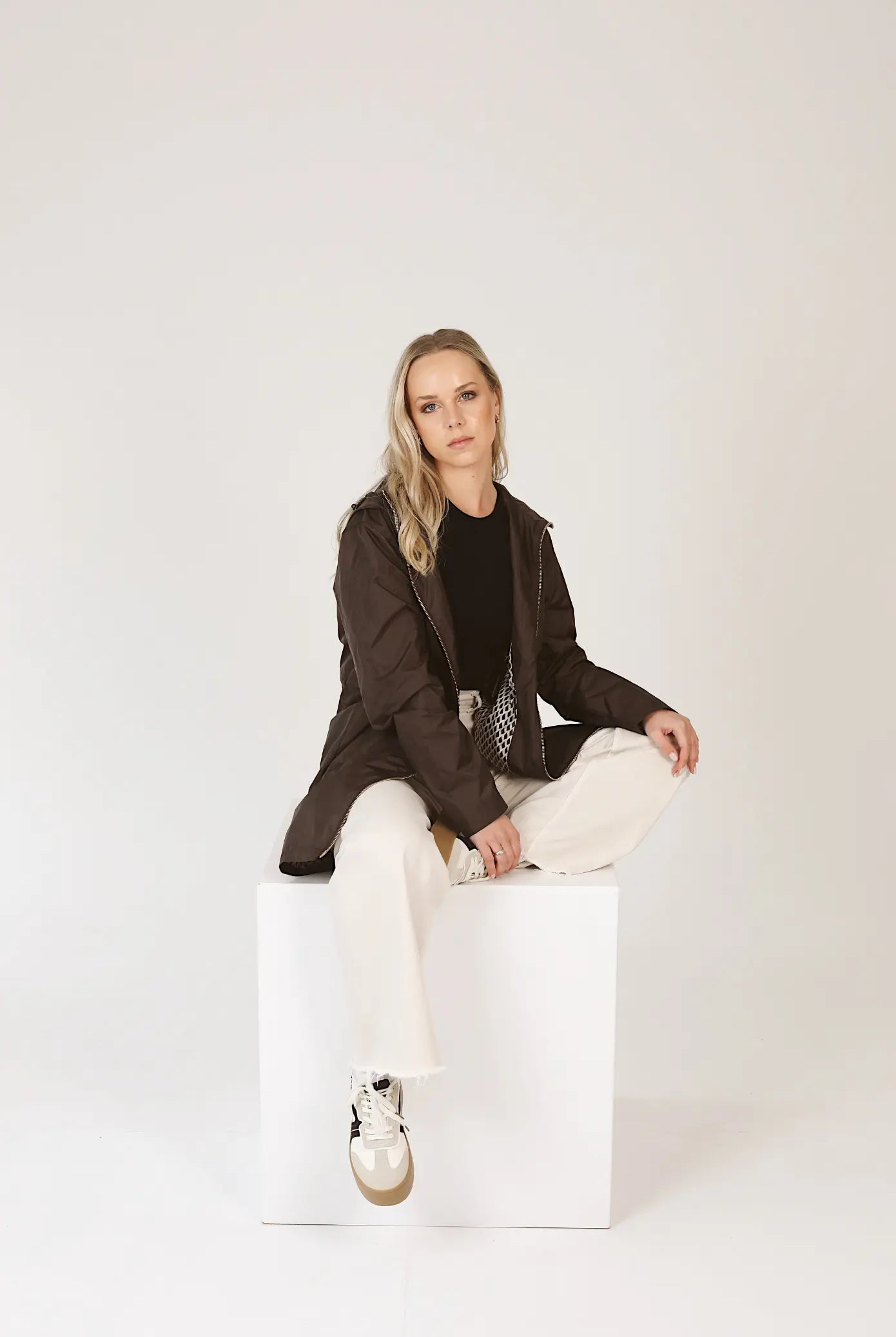 Truffle Haze dark brown hooded raincoat, modern lightweight waterproof raincoat perfect for Australia’s changing weather and rain