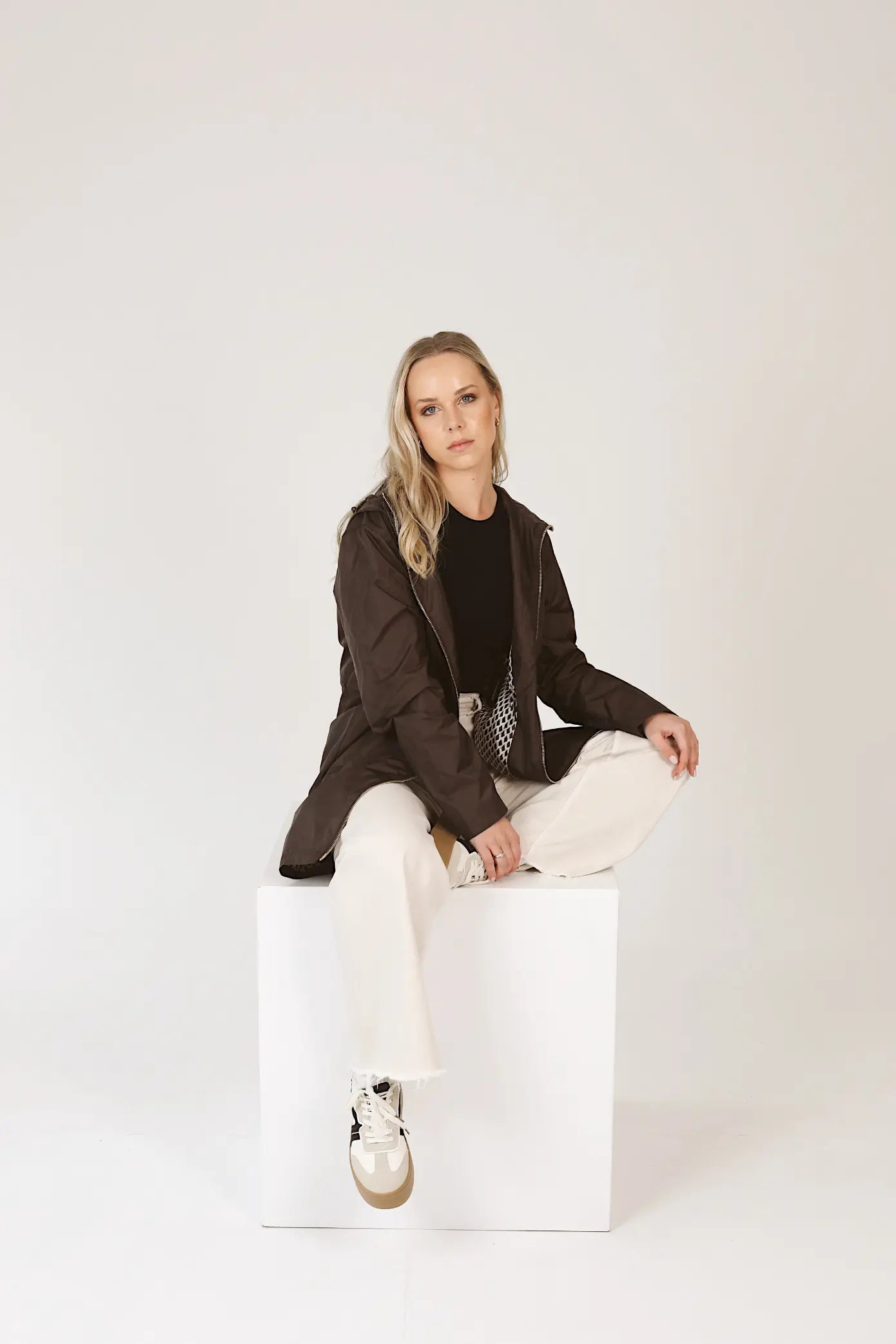 Truffle Haze dark brown hooded raincoat, modern lightweight waterproof raincoat perfect for Australia’s changing weather and rain