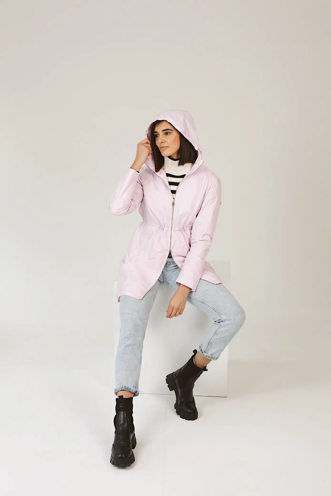 Rosewater Mist pastel pink hooded raincoat, modern lightweight waterproof raincoat perfect for wet weather in Australia.