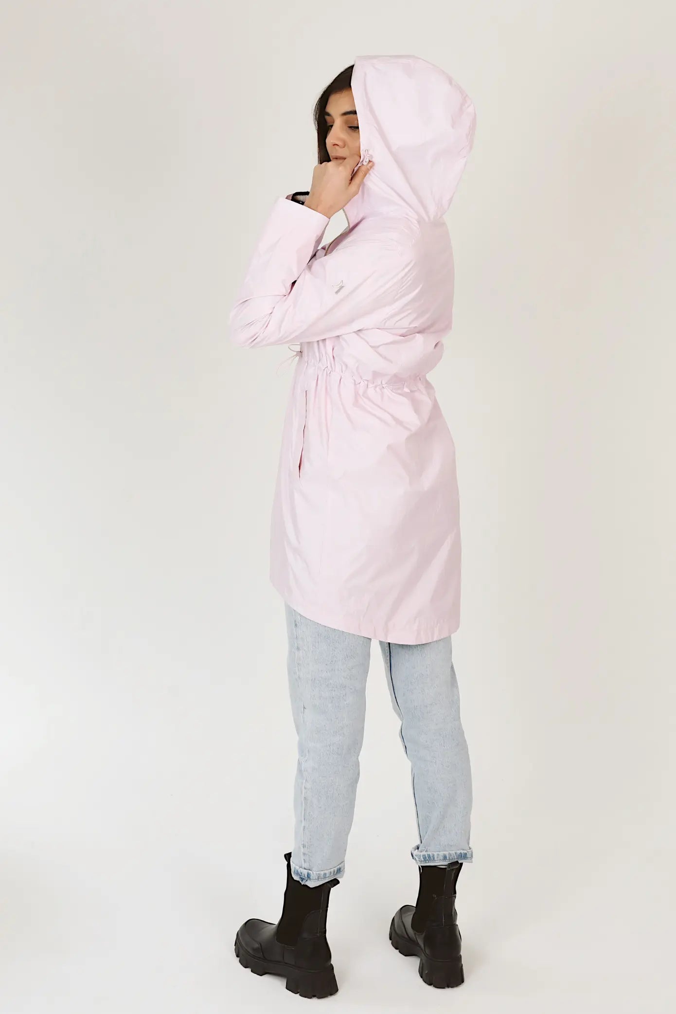 Rosewater Mist pastel pink hooded raincoat, modern lightweight waterproof raincoat perfect for wet weather in Australia.