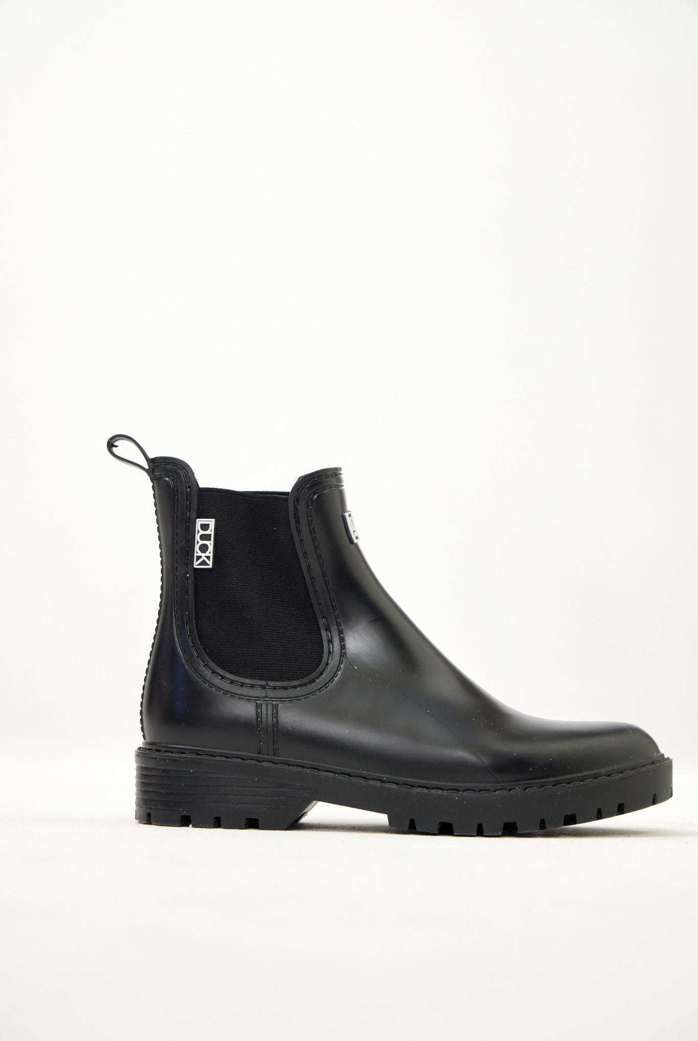 Black Ankle-length gumboots with elastic side panels and durable sole, designed for everyday outdoor and wet-weather use