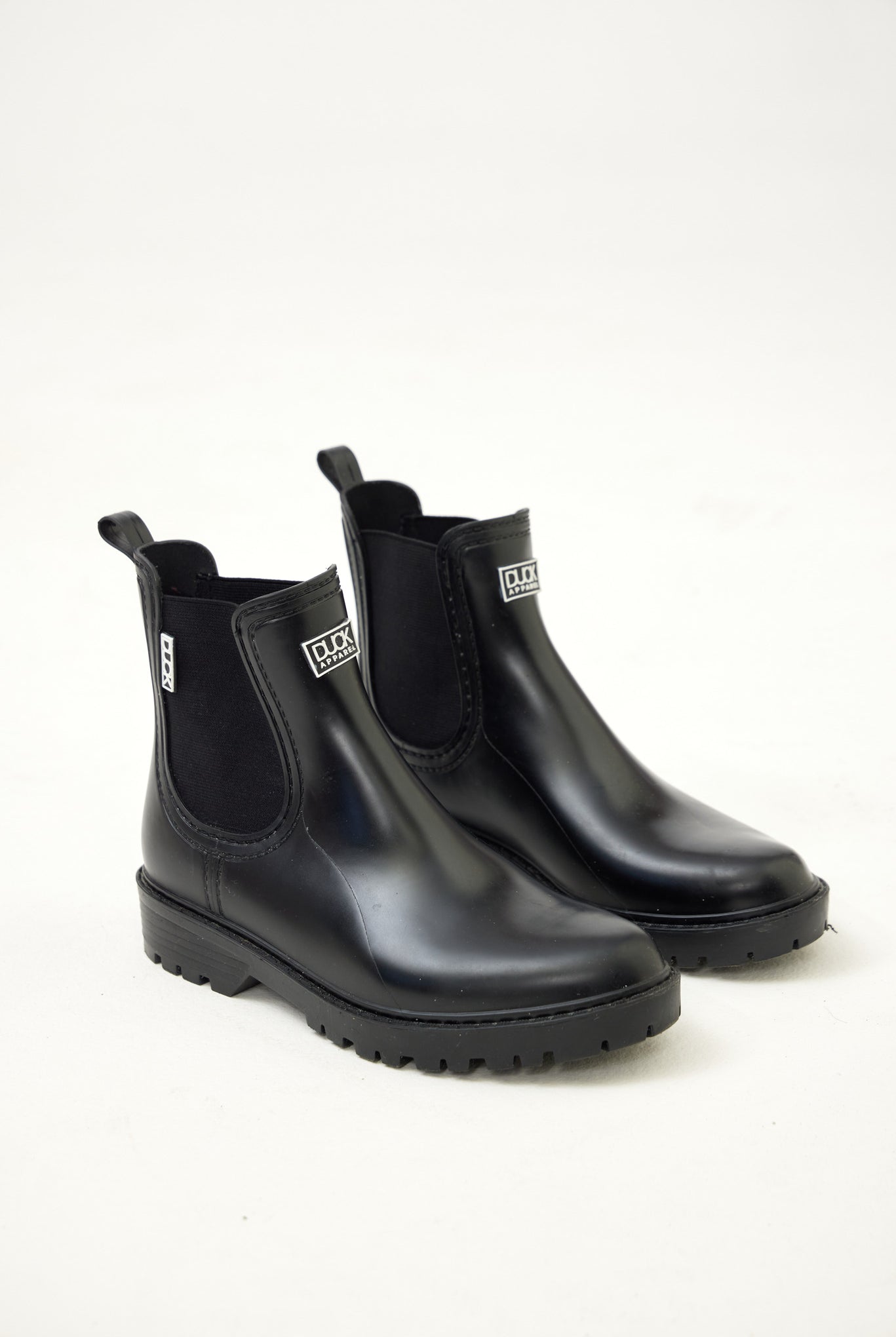 Black Ankle-length gumboots with elastic side panels and durable sole, designed for everyday outdoor and wet-weather use