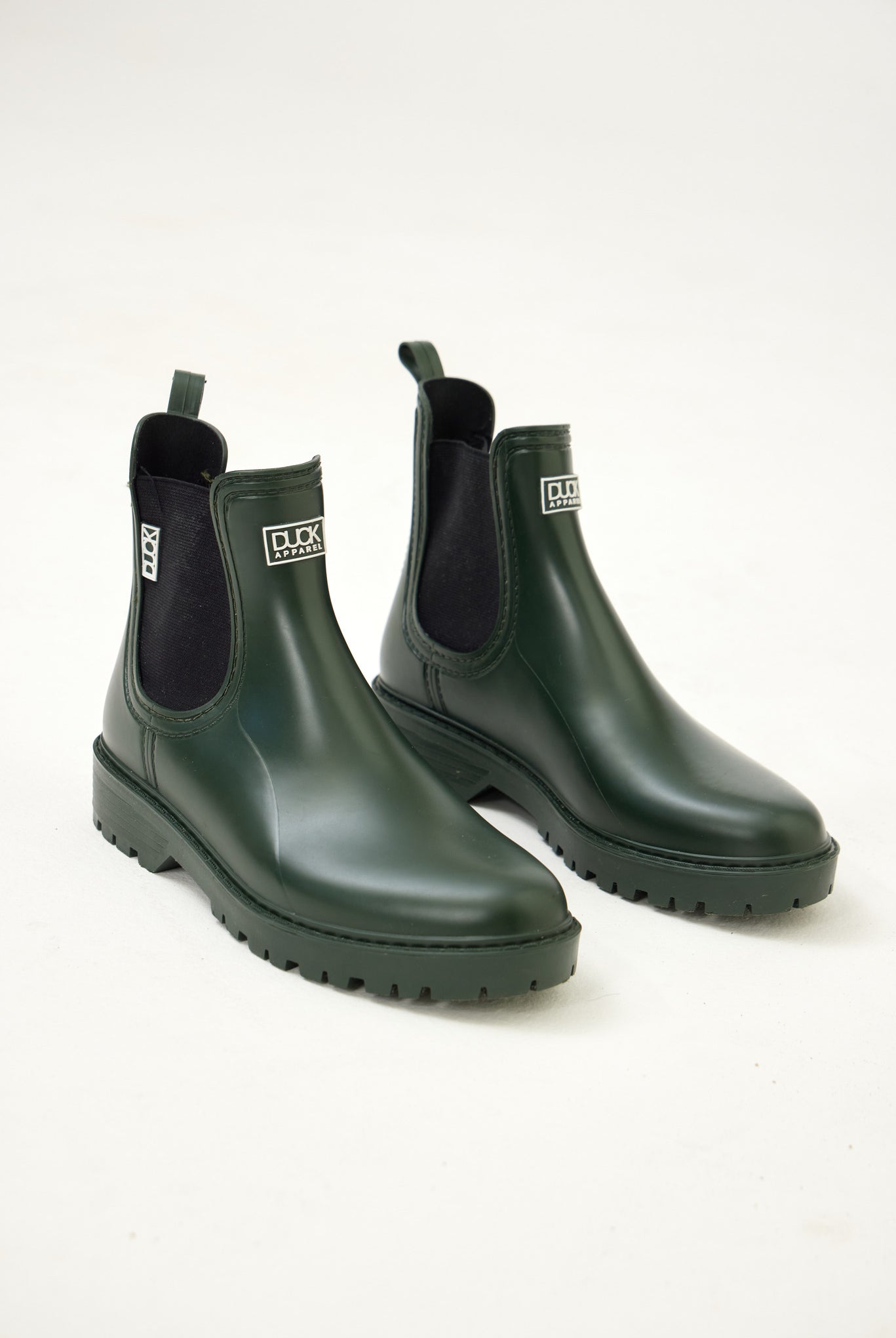 Green Ankle-length gumboots with elastic side panels and durable sole, designed for everyday outdoor and wet-weather use