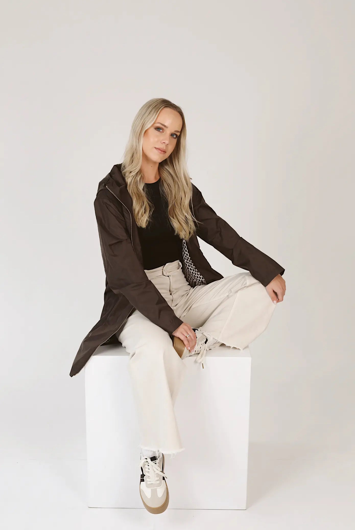 Truffle Haze dark brown hooded raincoat, modern lightweight waterproof raincoat perfect for Australia’s changing weather and rain