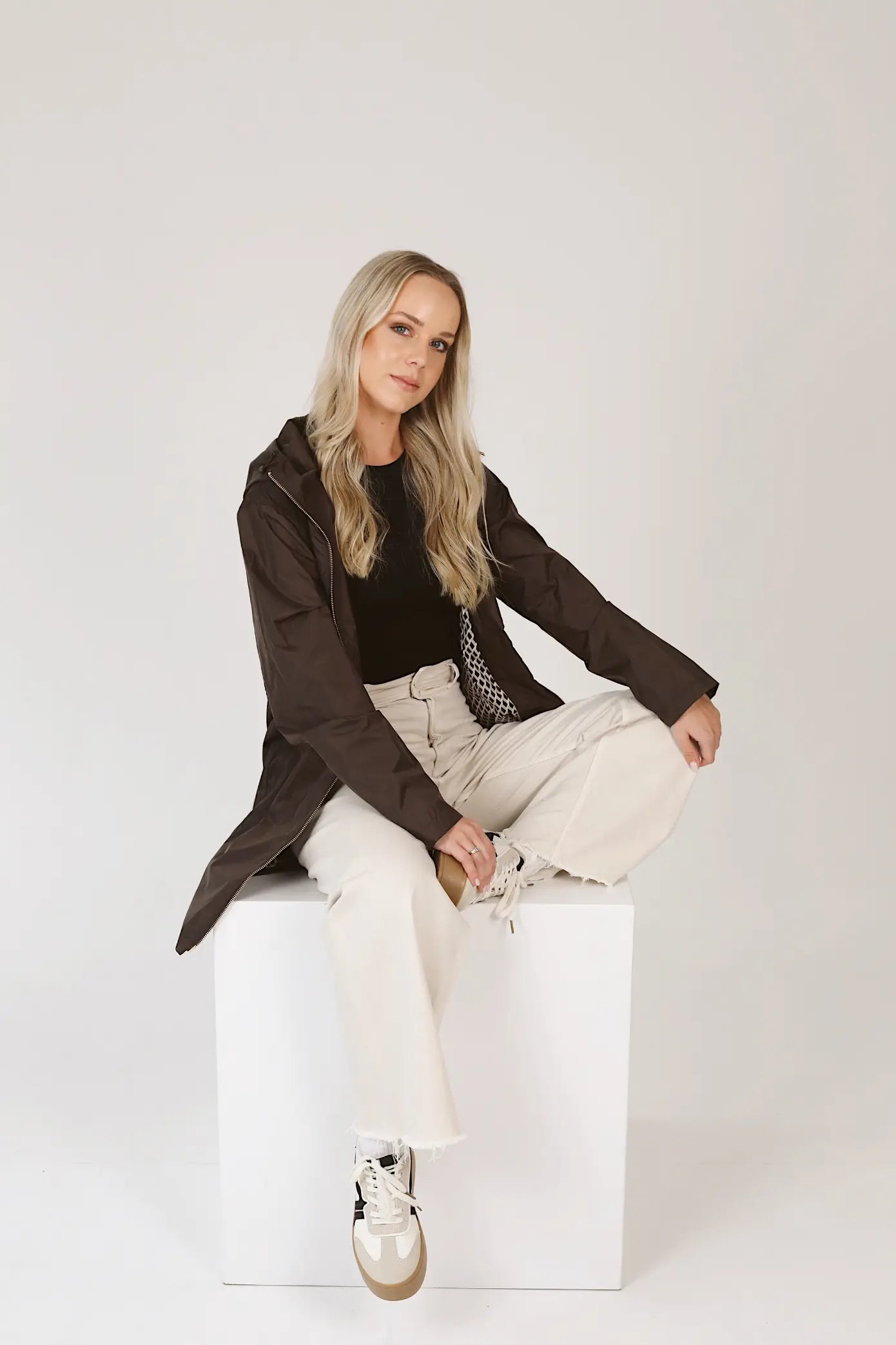 Truffle Haze dark brown hooded raincoat, modern lightweight waterproof raincoat perfect for Australia’s changing weather and rain