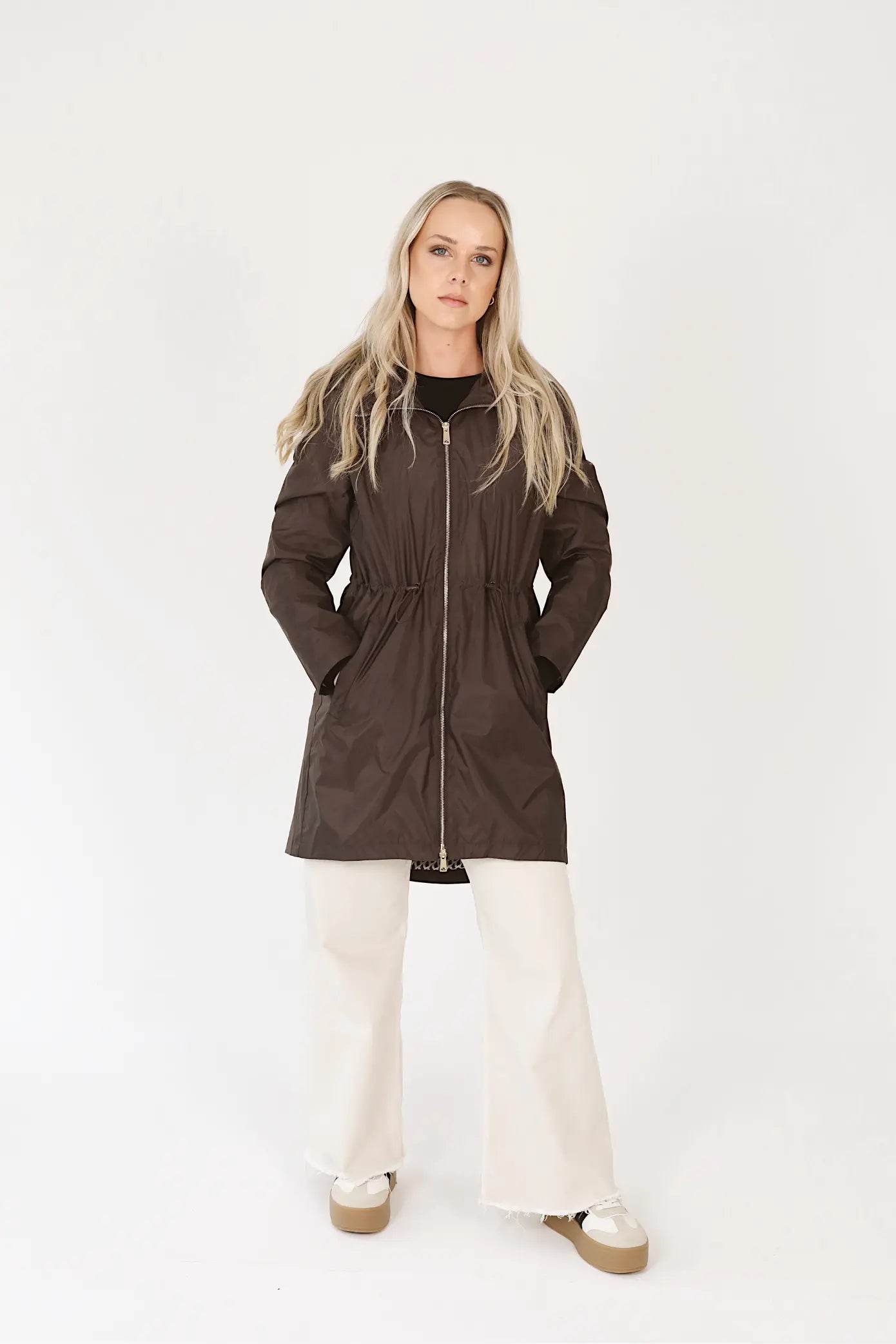 Truffle Haze dark brown hooded raincoat, modern lightweight waterproof raincoat perfect for Australia’s changing weather and rain