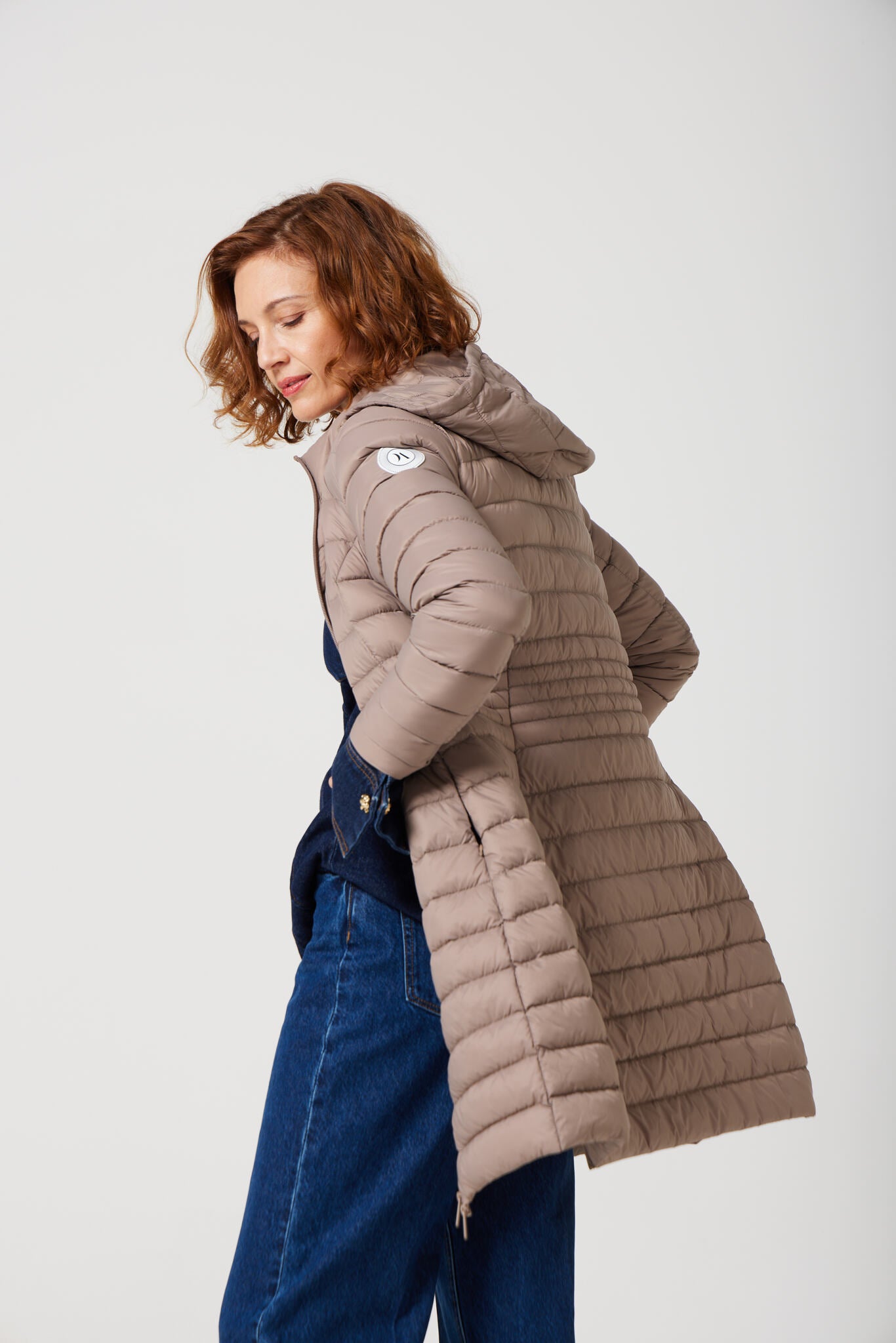 Women’s chai beige insulated midi parka with hood, warm winter jacket perfect for layering in Australia’s cooler weather — Chai Midi Parka™