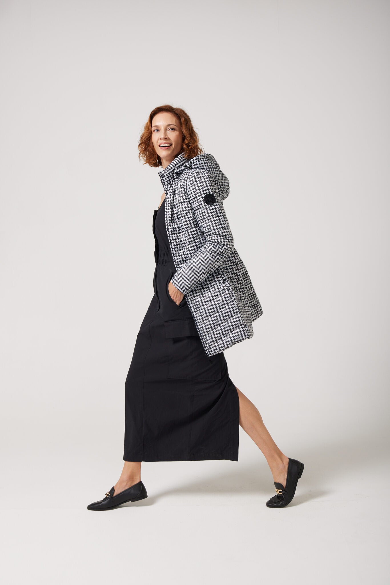 Women’s houndstooth print and midnight black reversible insulated parka with hood, warm winter parka perfect for layering in Australia’s cooler weather — Midnight x Houndstooth Classic Parka™