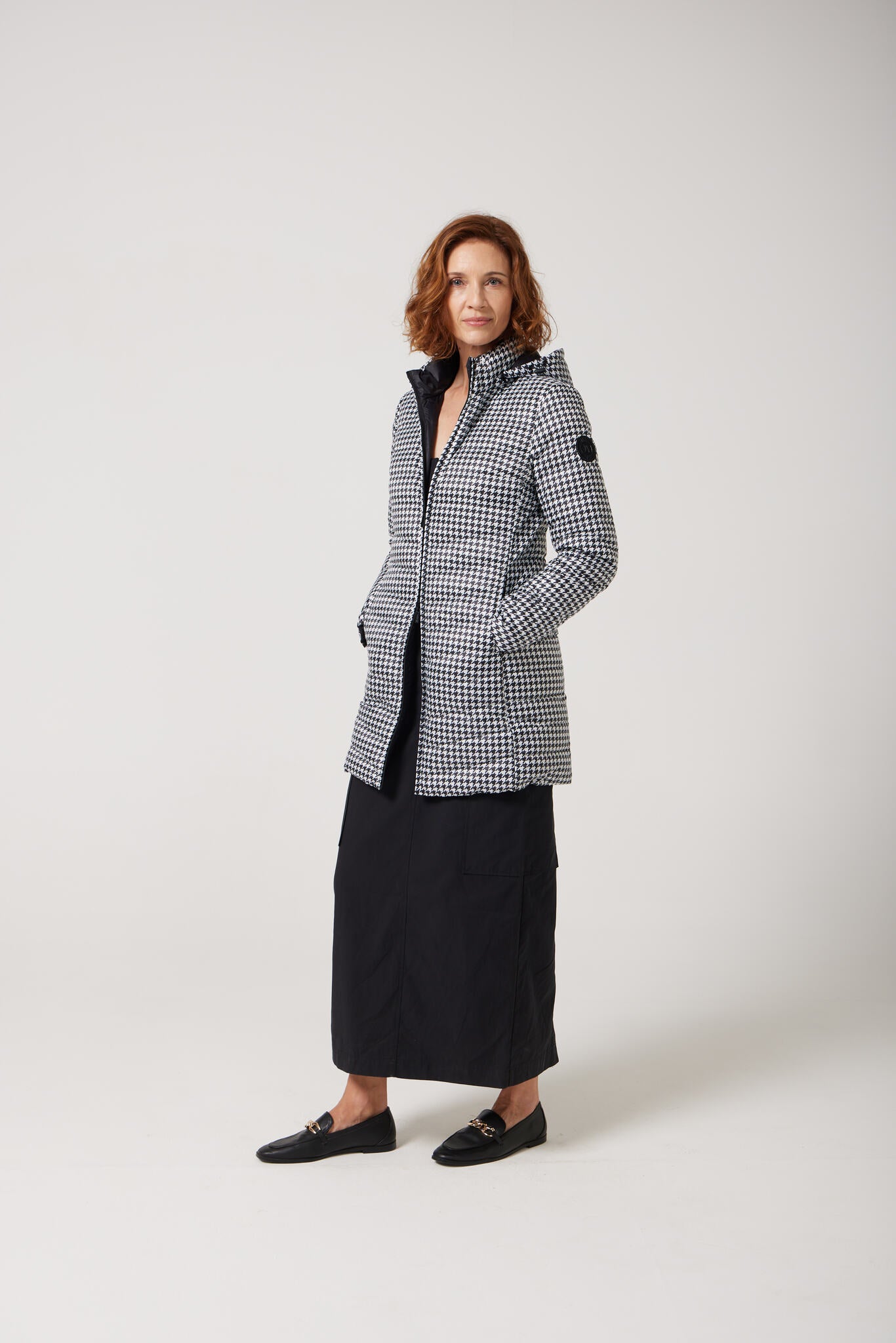 Women’s houndstooth print and midnight black reversible insulated parka with hood, warm winter parka perfect for layering in Australia’s cooler weather — Midnight x Houndstooth Classic Parka™