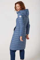 Women’s sky blue insulated ultra parka with hood, long warm winter jacket perfect for layering in Australia’s cooler weather — Vista Ultra Parka™