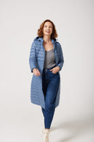 Women’s sky blue insulated ultra parka with hood, long warm winter jacket perfect for layering in Australia’s cooler weather — Vista Ultra Parka™