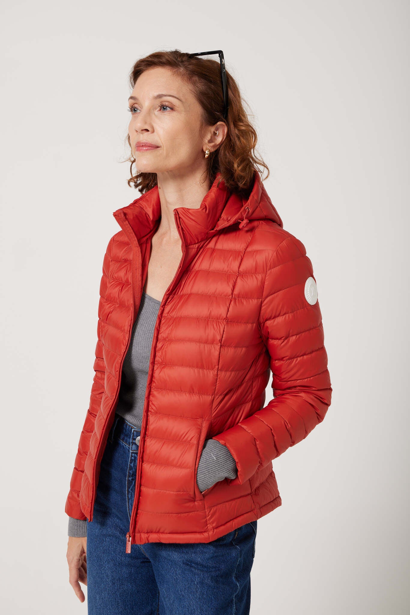 Women’s Rust Classic Jacket™ in vibrant red, stylish lightweight puffer jacket for everyday wear and seasonal outerwear in Australia
