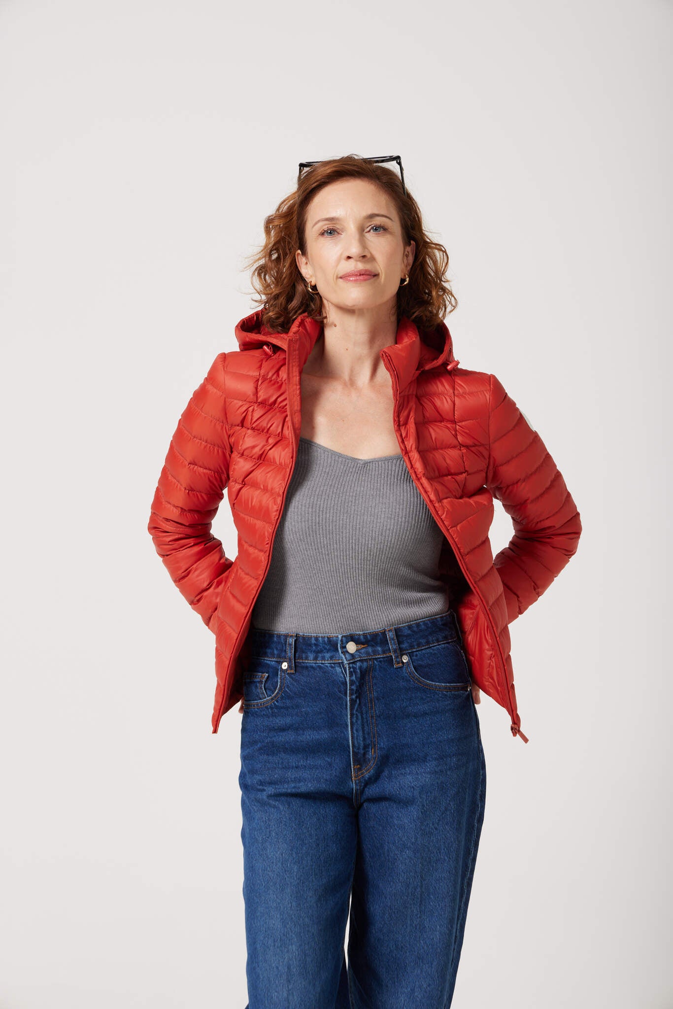Women’s Rust Classic Jacket™ in vibrant red, stylish lightweight puffer jacket for everyday wear and seasonal outerwear in Australia