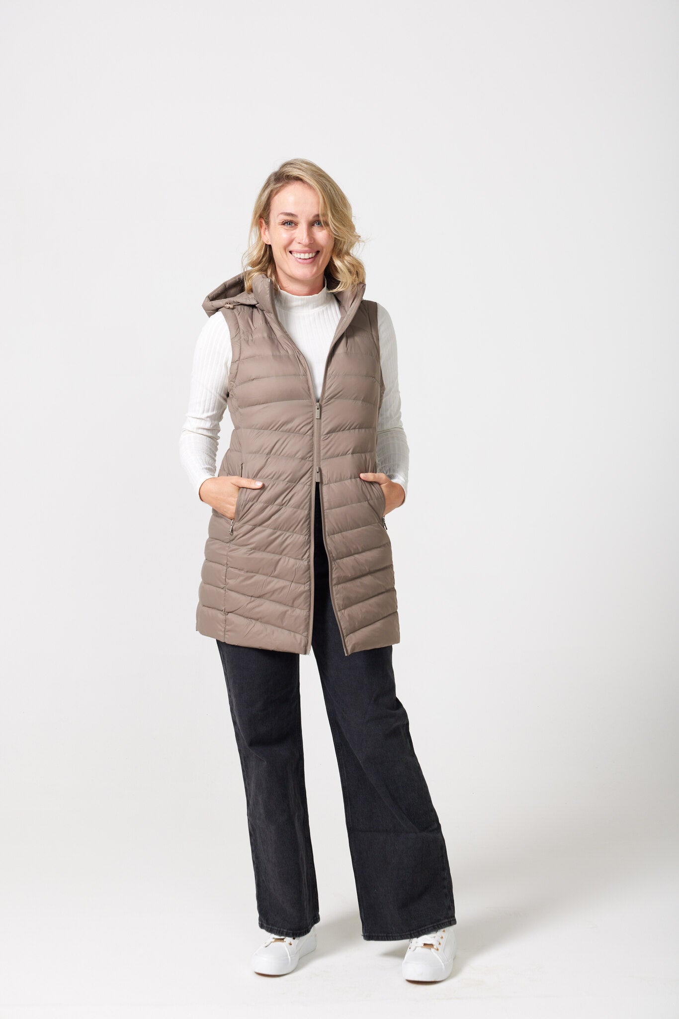 Chai Longline Gilet™ — women’s sleeveless quilted puffer vest in chai brown, extended longline cut with hood, perfect for versatile layering in Australia