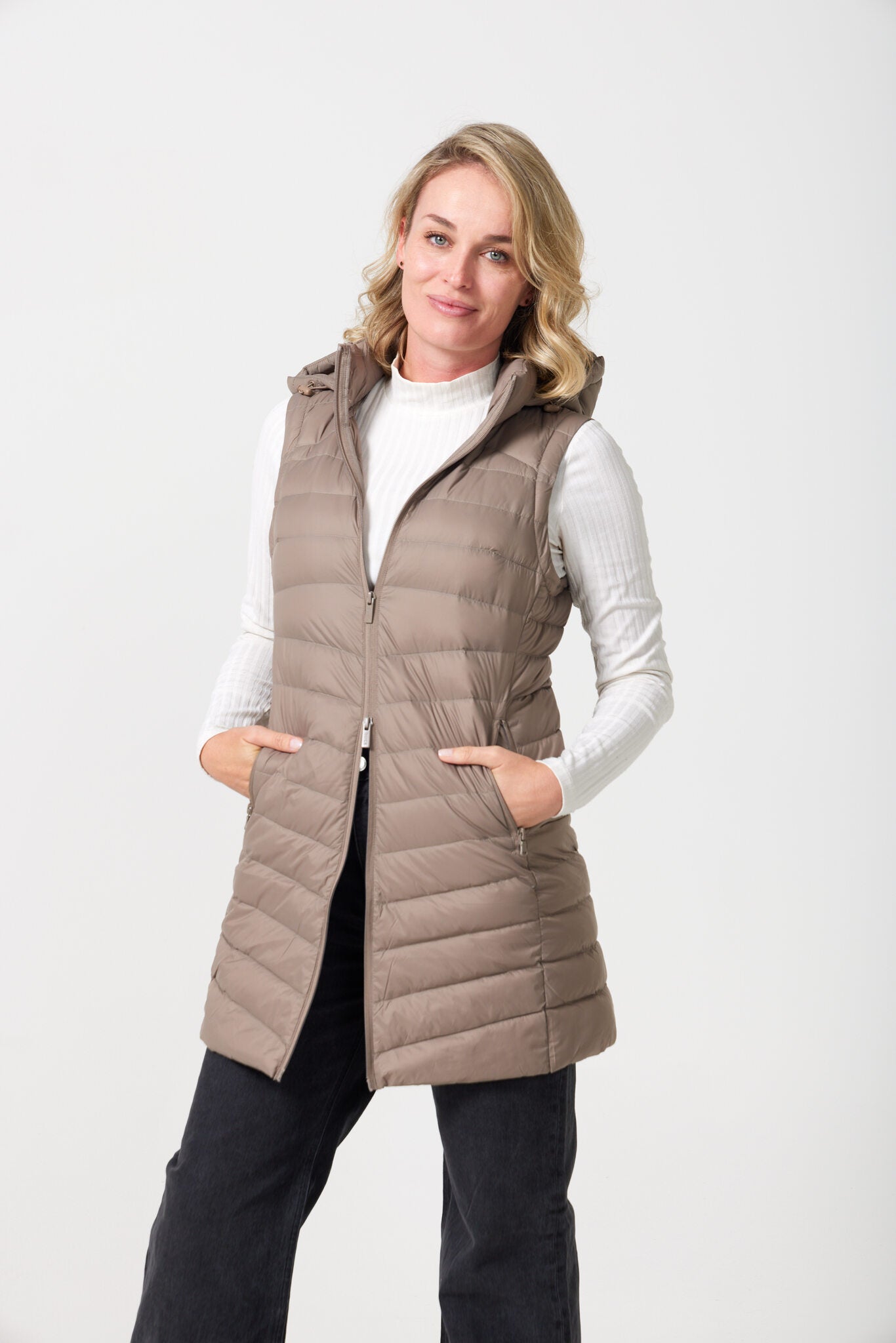Chai Longline Gilet™ — women’s sleeveless quilted puffer vest in chai brown, extended longline cut with hood, perfect for versatile layering in Australia
