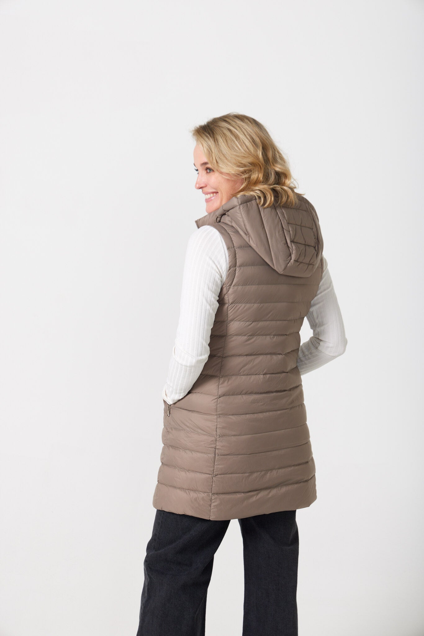 Chai Longline Gilet™ — women’s sleeveless quilted puffer vest in chai brown, extended longline cut with hood, perfect for versatile layering in Australia
