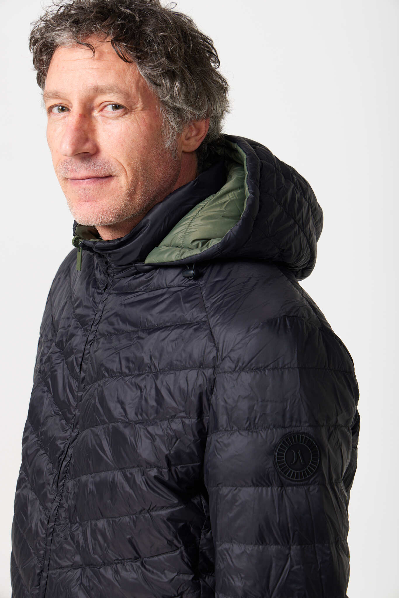 Men’s reversible insulated hooded jacket in sage green and black, lightweight and versatile for cooler Australian weather — Sage x Black Classic Jacket™