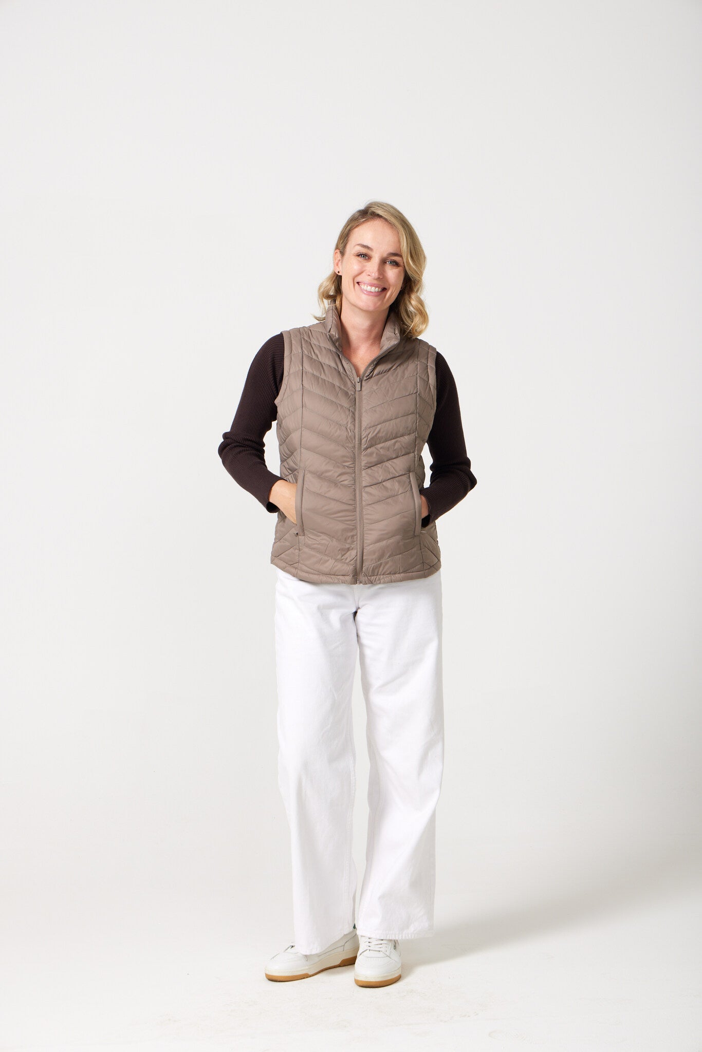 Chai Classic Gilet™ — women’s classic sleeveless puffer vest in soft chai beige, ideal for layering across seasons in Australia.