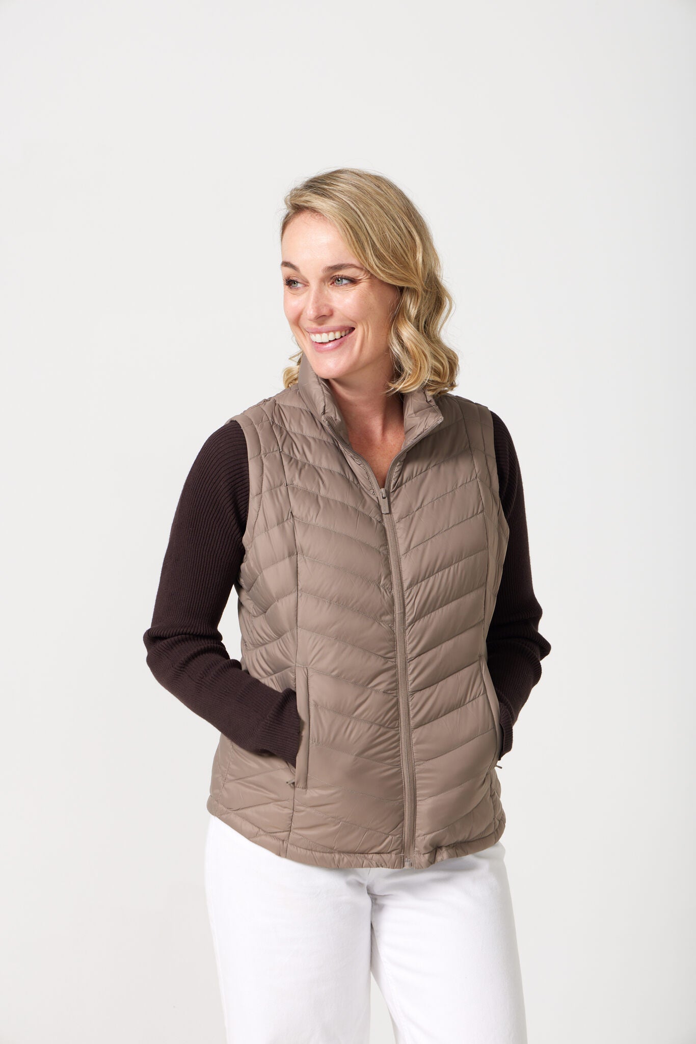 Chai Classic Gilet™ — women’s classic sleeveless puffer vest in soft chai beige, ideal for layering across seasons in Australia.