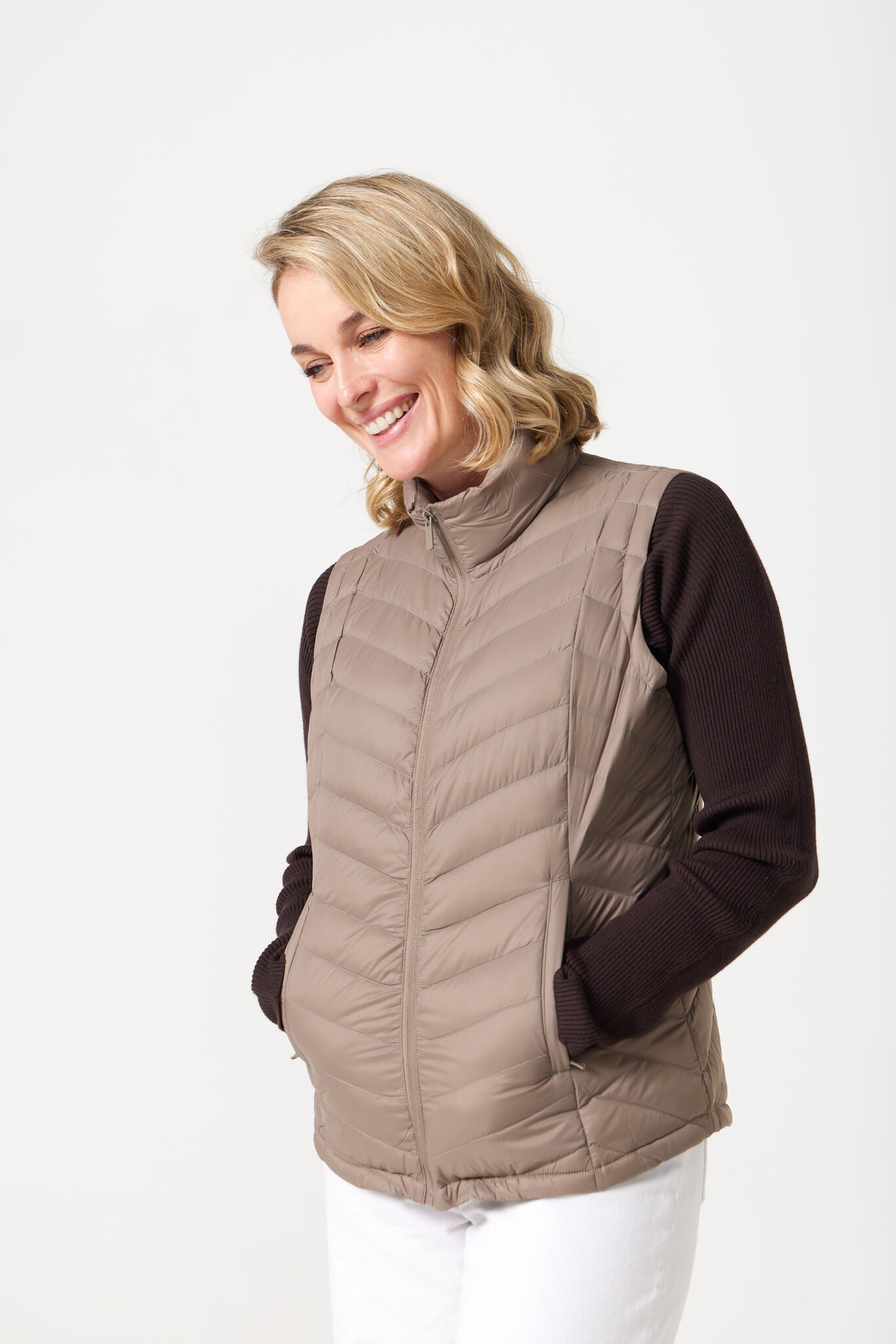 Chai Classic Gilet™ — women’s classic sleeveless puffer vest in soft chai beige, ideal for layering across seasons in Australia.