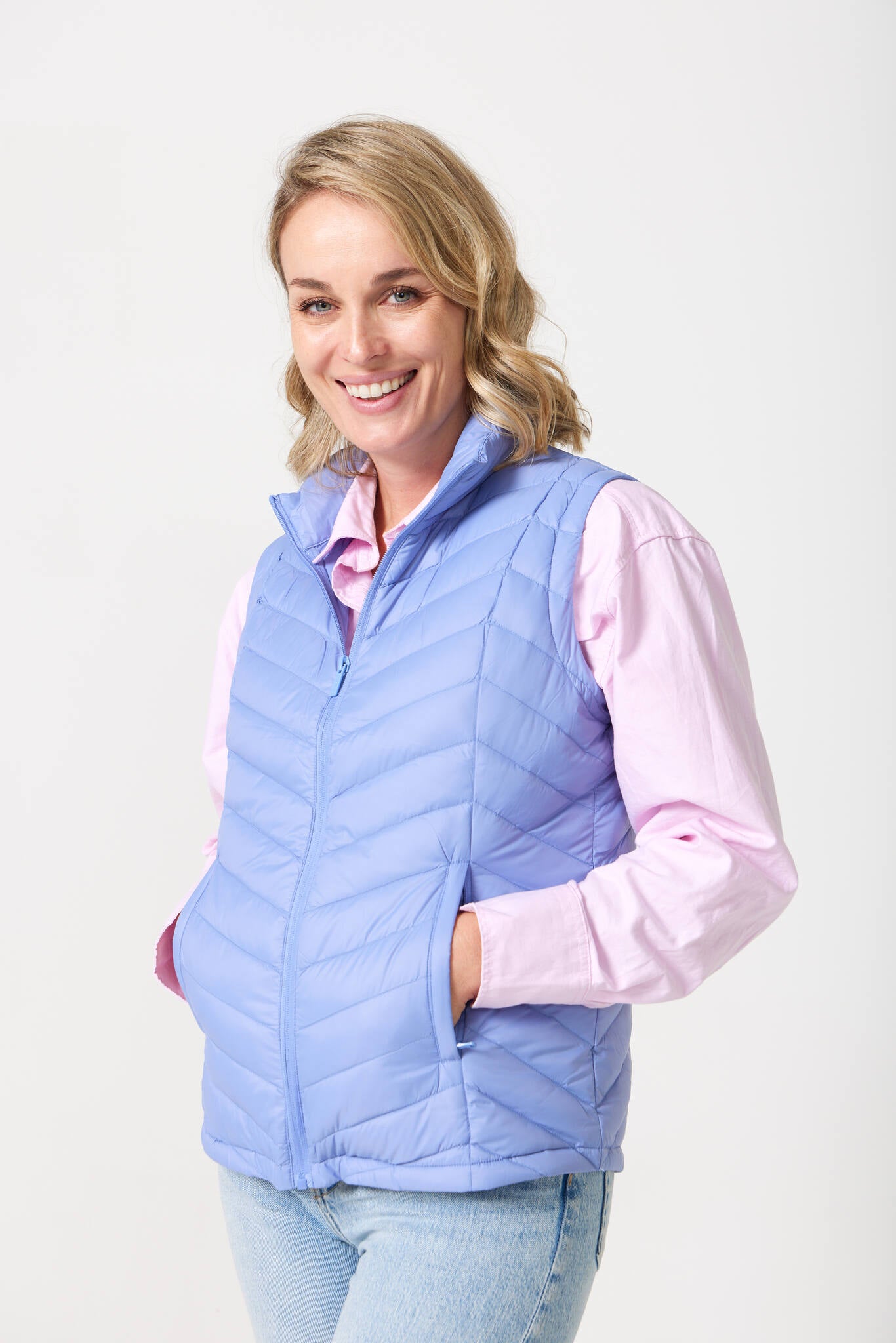 Vista Classic Gilet™ — women’s classic sleeveless puffer vest in fresh vista blue, perfect for layering across seasons in Australia