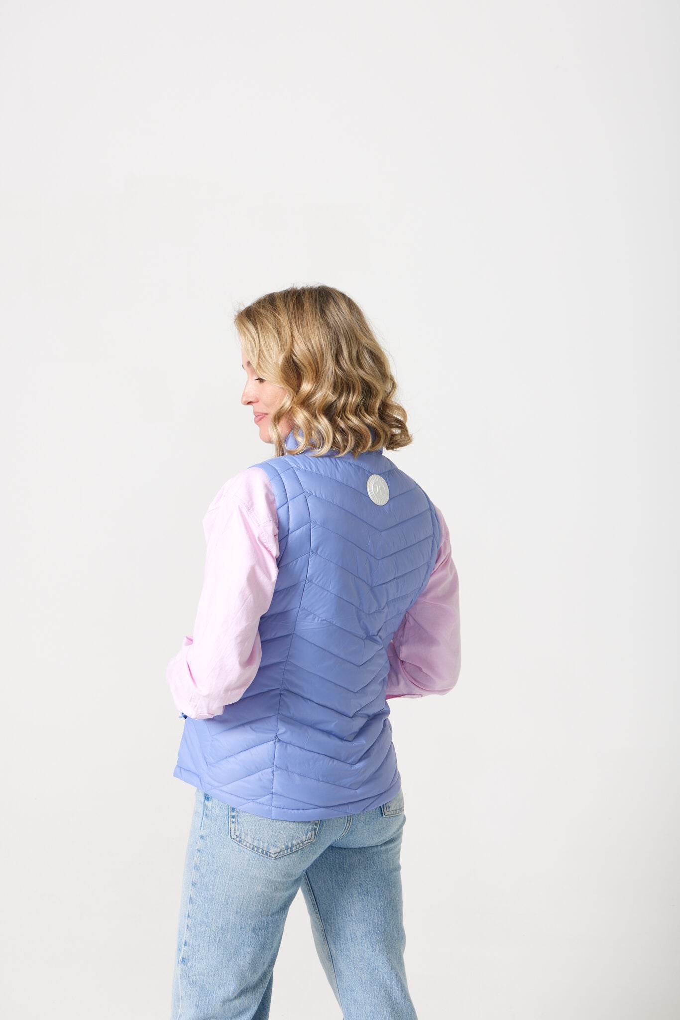 Vista Classic Gilet™ — women’s classic sleeveless puffer vest in fresh vista blue, perfect for layering across seasons in Australia