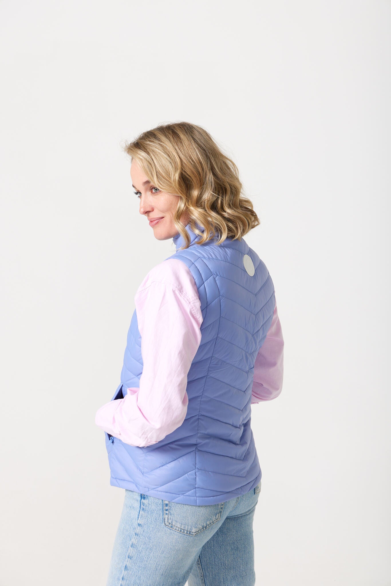 Vista Classic Gilet™ — women’s classic sleeveless puffer vest in fresh vista blue, perfect for layering across seasons in Australia