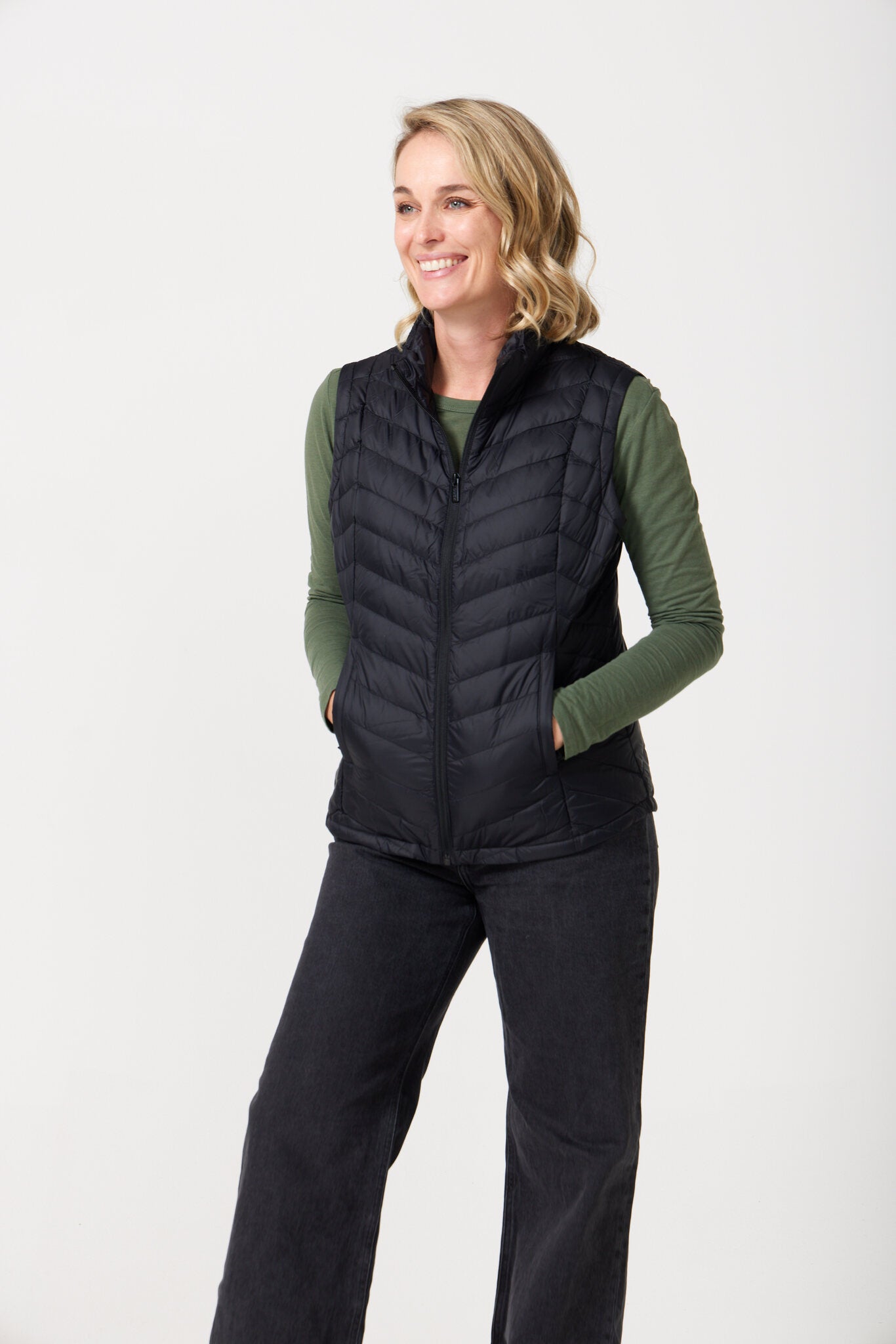 Midnight Classic Gilet™ — women’s classic sleeveless puffer vest in timeless midnight black, perfect for layering across seasons in Australia.