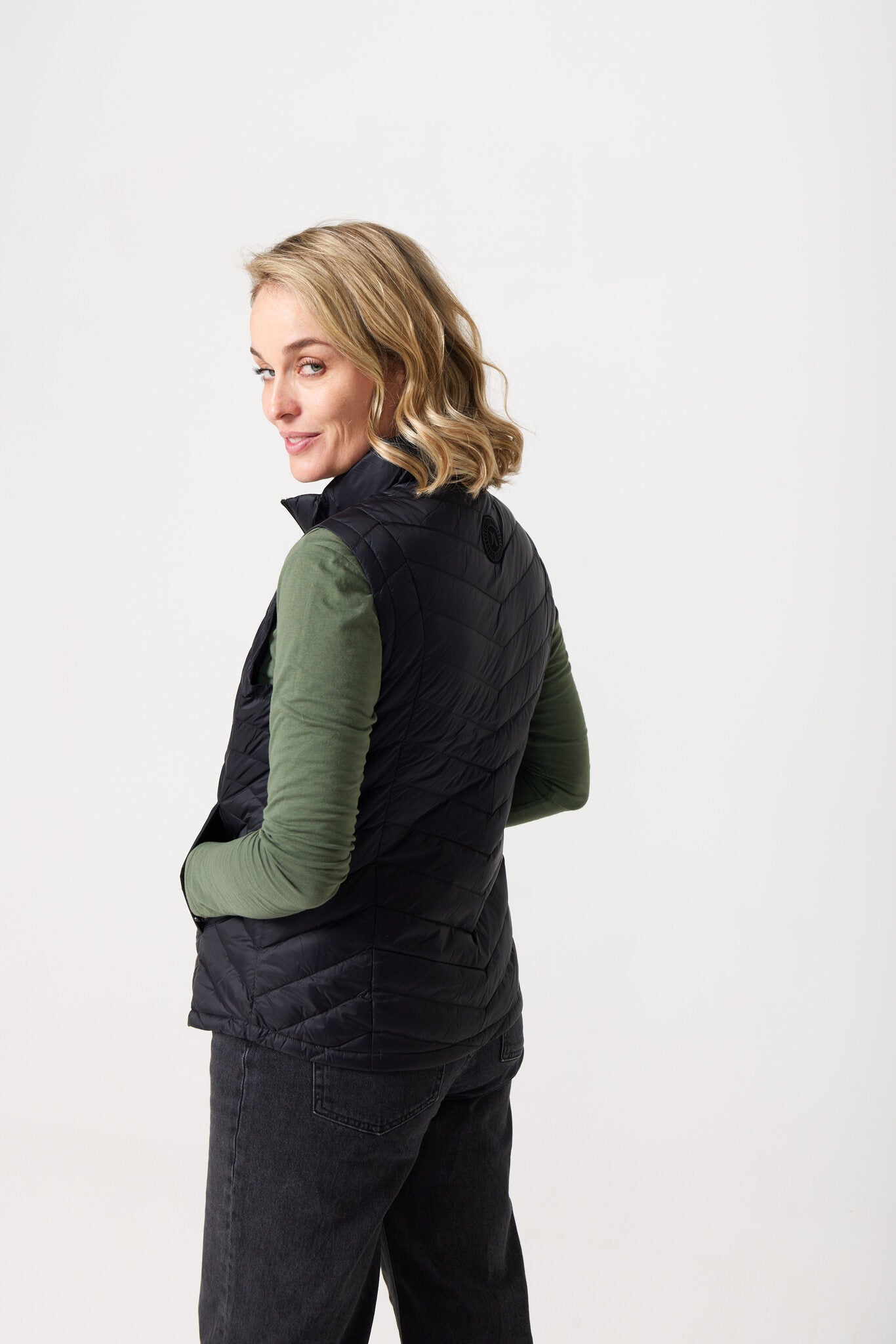 Midnight Classic Gilet™ — women’s classic sleeveless puffer vest in timeless midnight black, perfect for layering across seasons in Australia.