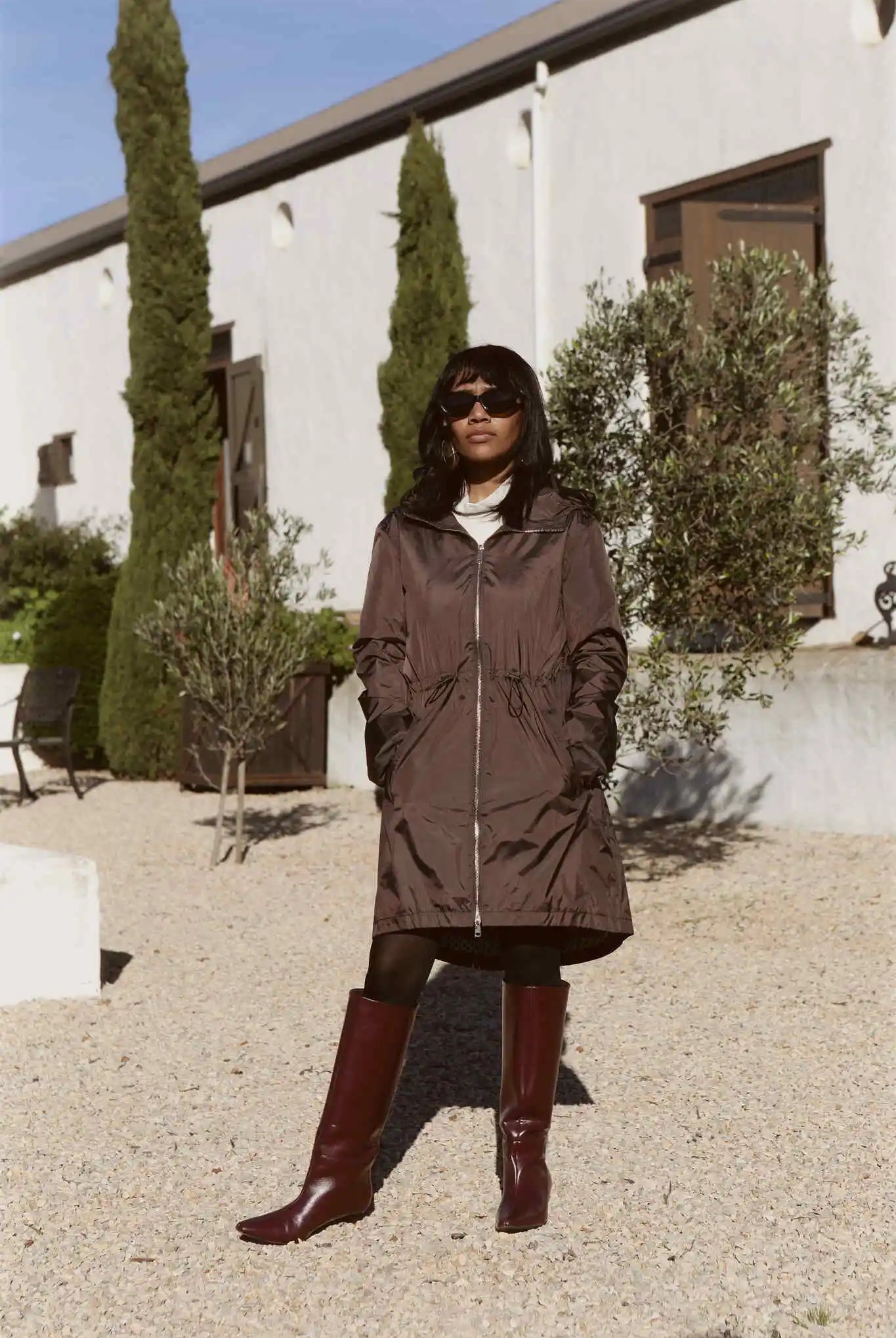 Truffle Haze dark brown hooded raincoat, modern lightweight waterproof raincoat perfect for Australia’s changing weather and rain