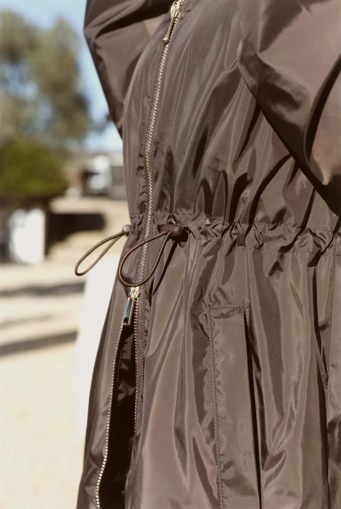 Truffle Haze dark brown hooded raincoat, modern lightweight waterproof raincoat perfect for Australia’s changing weather and rain