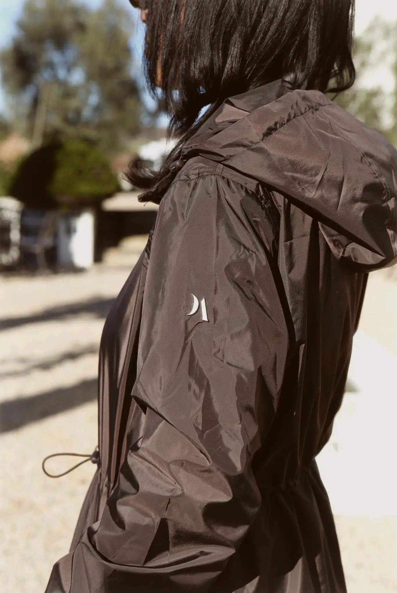 Truffle Haze dark brown hooded raincoat, modern lightweight waterproof raincoat perfect for Australia’s changing weather and rain