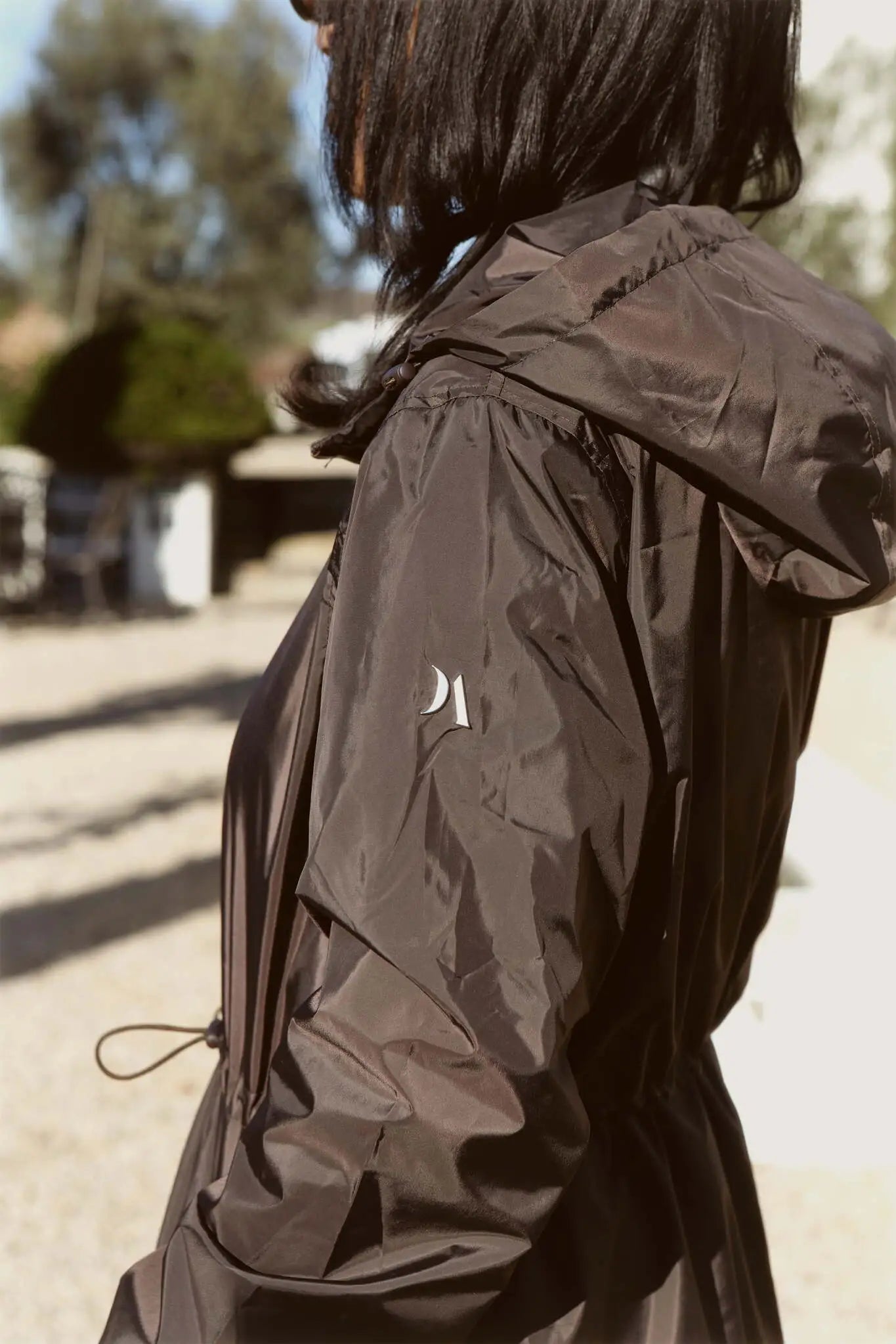 Truffle Haze dark brown hooded raincoat, modern lightweight waterproof raincoat perfect for Australia’s changing weather and rain