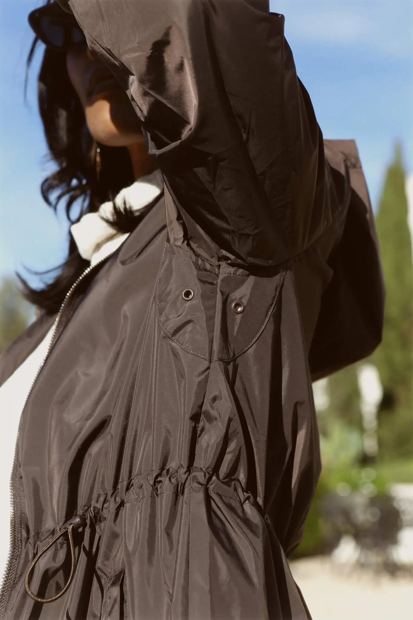 Truffle Haze dark brown hooded raincoat, modern lightweight waterproof raincoat perfect for Australia’s changing weather and rain