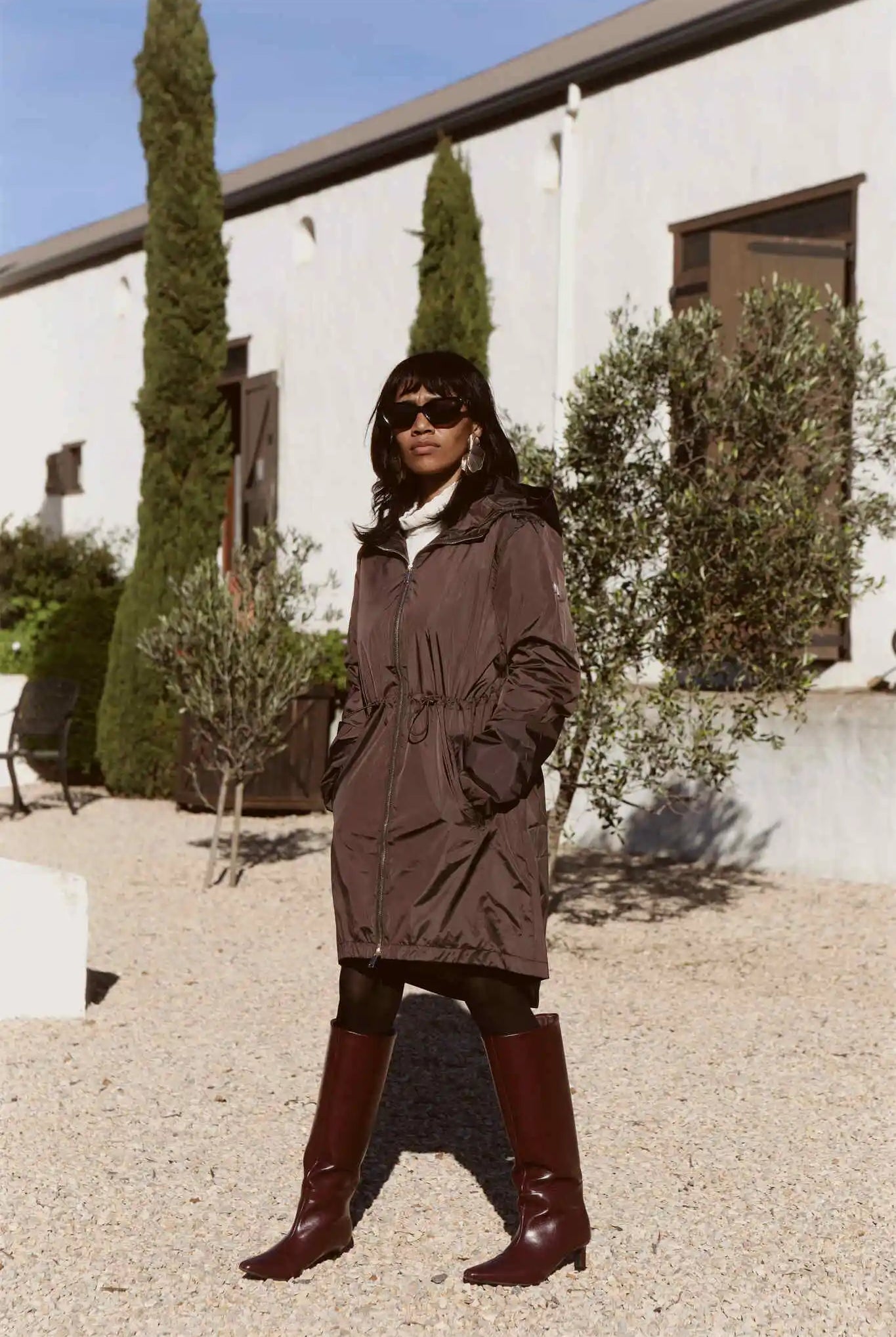 Truffle Haze dark brown hooded raincoat, modern lightweight waterproof raincoat perfect for Australia’s changing weather and rain