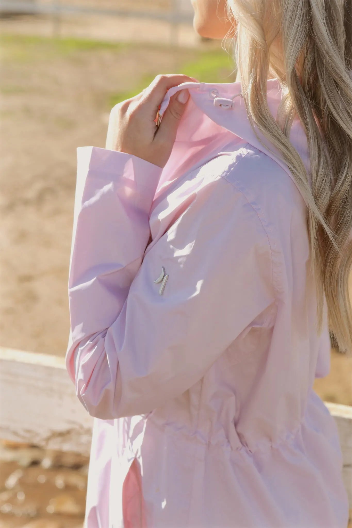 Rosewater Mist pastel pink hooded raincoat, modern lightweight waterproof raincoat perfect for wet weather in Australia.