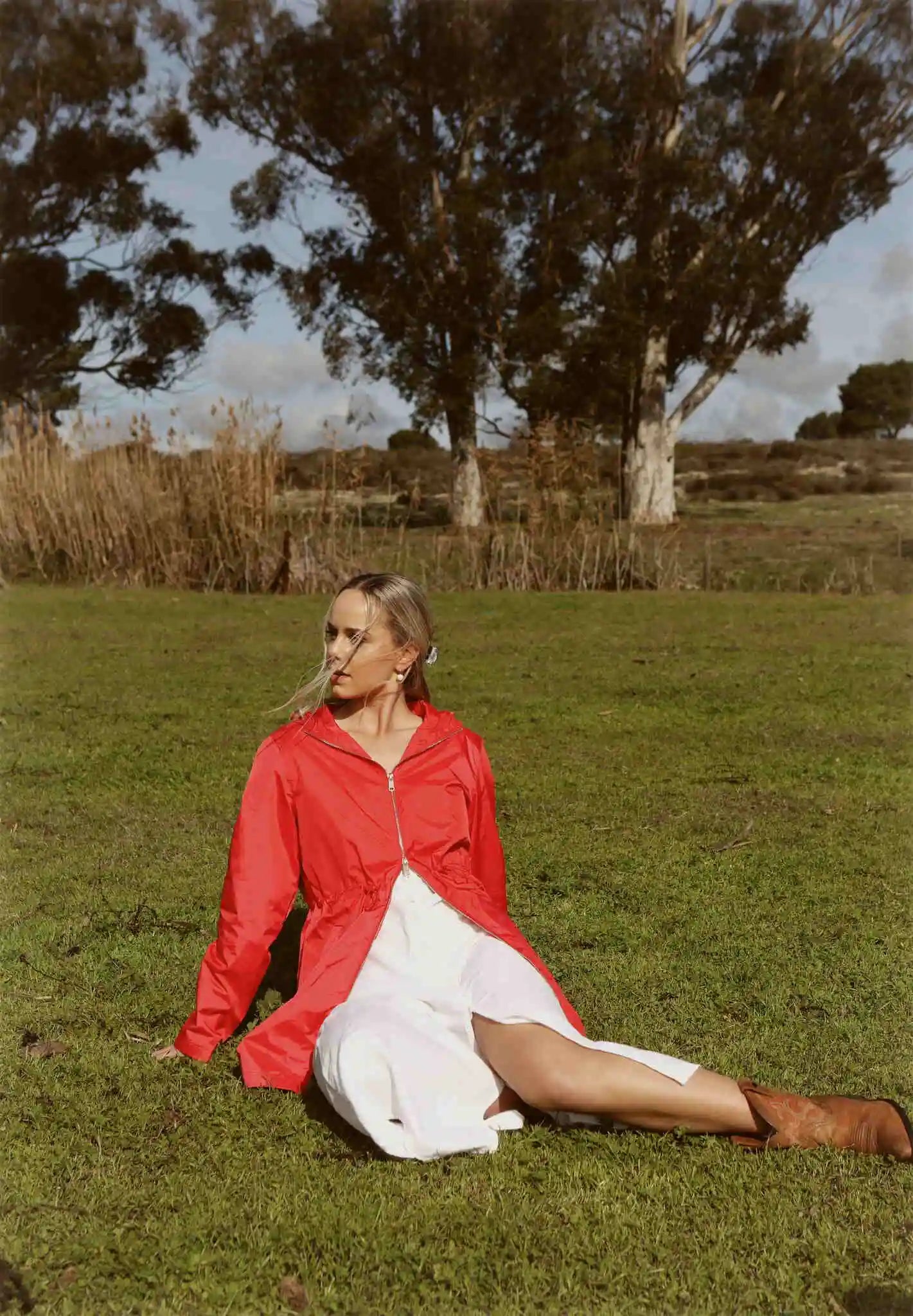 Lipstick Crush No 5 bright red hooded raincoat, modern lightweight waterproof raincoat perfect for wet weather in Australia