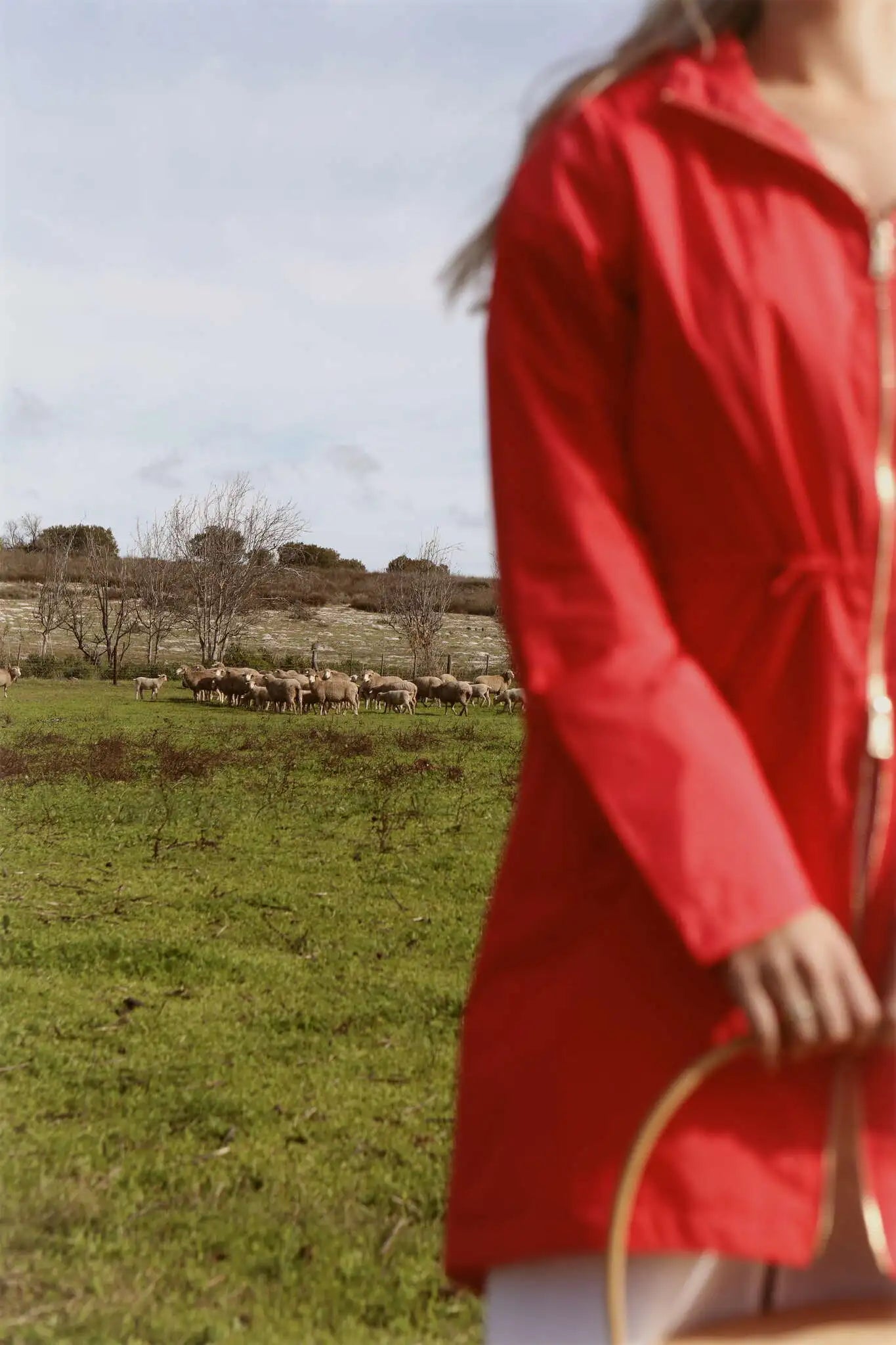 Lipstick Crush No 5 bright red hooded raincoat, modern lightweight waterproof raincoat perfect for wet weather in Australia