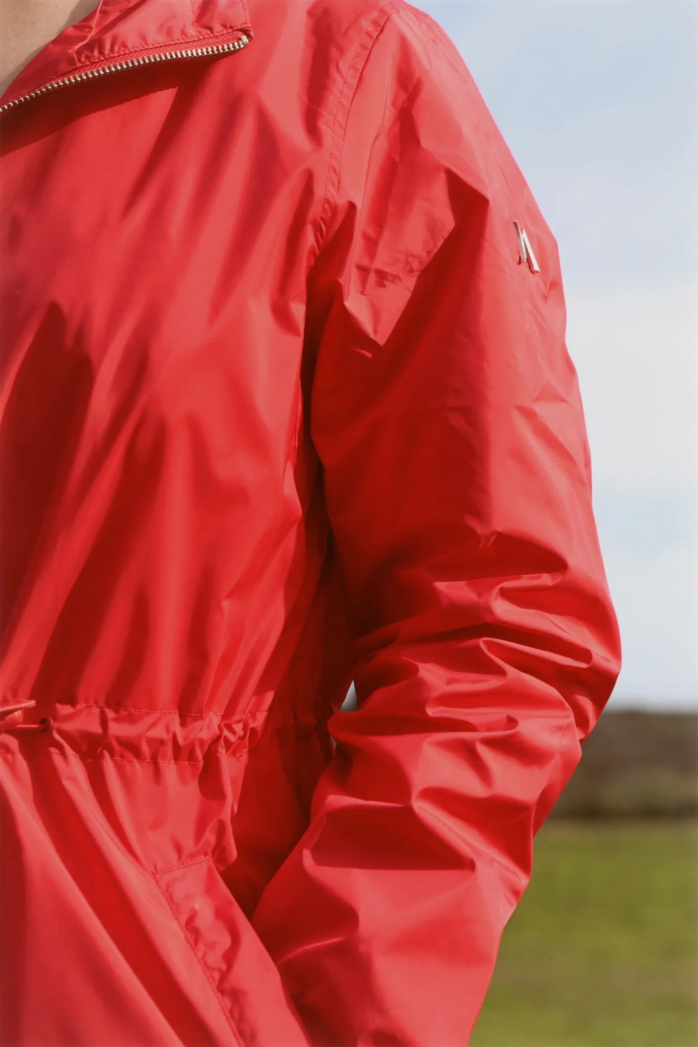 Lipstick Crush No 5 bright red hooded raincoat, modern lightweight waterproof raincoat perfect for wet weather in Australia