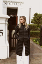 Women’s midnight black insulated ultra parka with hood, long warm winter parka perfect for layering in Australia’s cooler weather — Midnight Ultra Parka™