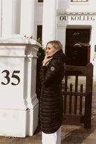 Women’s midnight black insulated ultra parka with hood, long warm winter parka perfect for layering in Australia’s cooler weather — Midnight Ultra Parka™