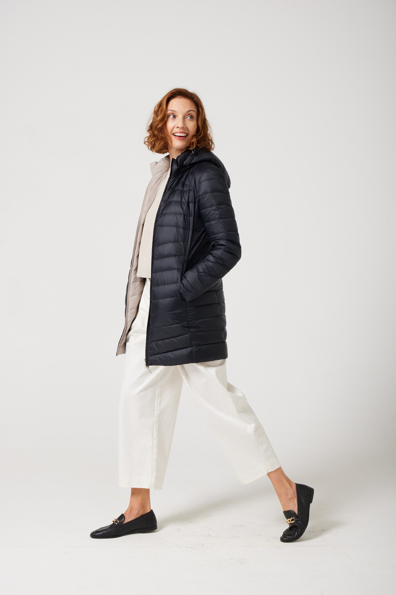 Women’s ebony black and ivory reversible insulated parka with hood, warm winter parka perfect for layering in Australia’s cooler weather — Ebony x Ivory Classic Parka™