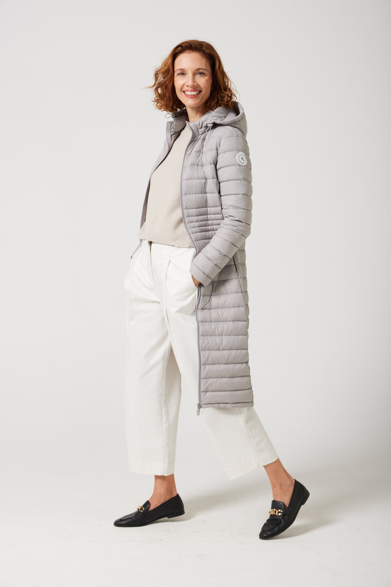 Women’s latte beige insulated ultra parka with hood, long warm winter jacket perfect for layering in Australia’s cooler weather — Latte Ultra Parka™