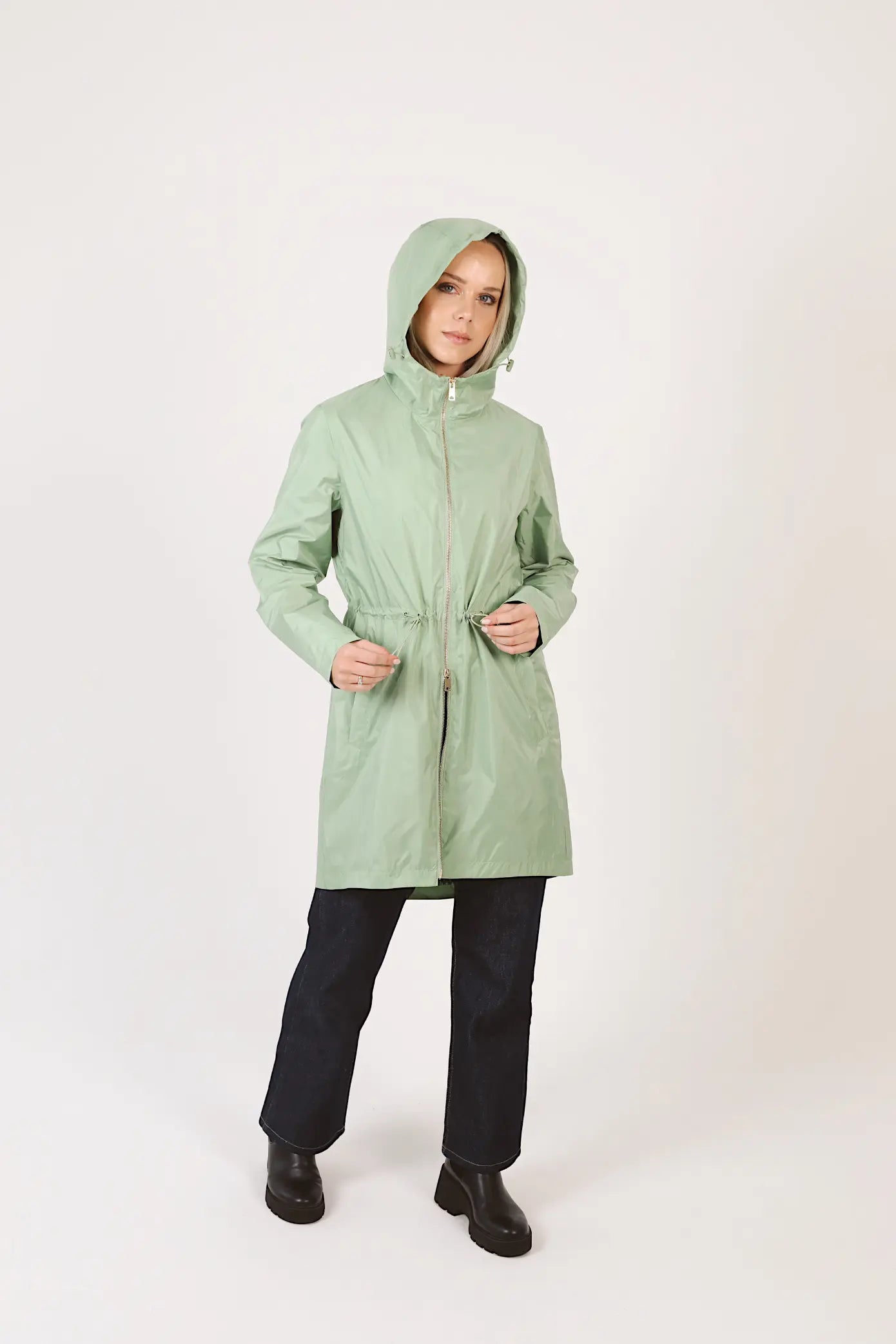 Madame Verde Vol 1 mint green hooded raincoat, lightweight waterproof jacket perfect for wet weather in Australia.