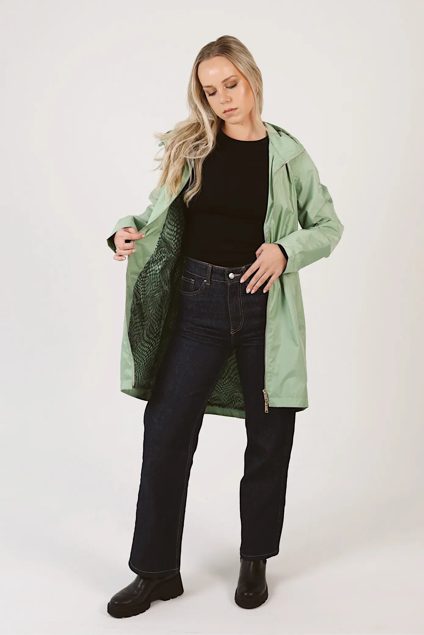 Madame Verde Vol 1 mint green hooded raincoat, lightweight waterproof jacket perfect for wet weather in Australia.