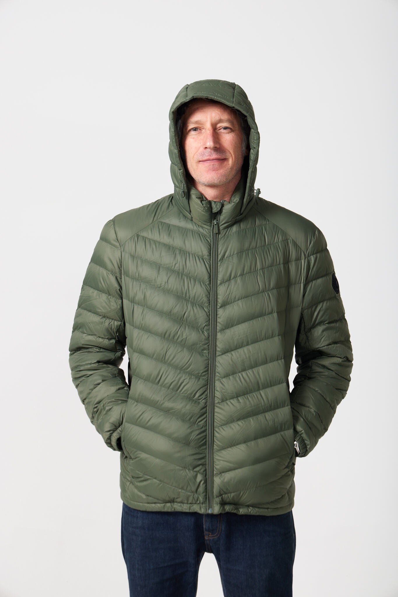 Men’s Sage Classic Jacket™ in green, lightweight hooded puffer jacket designed for versatile everyday wear in Australia