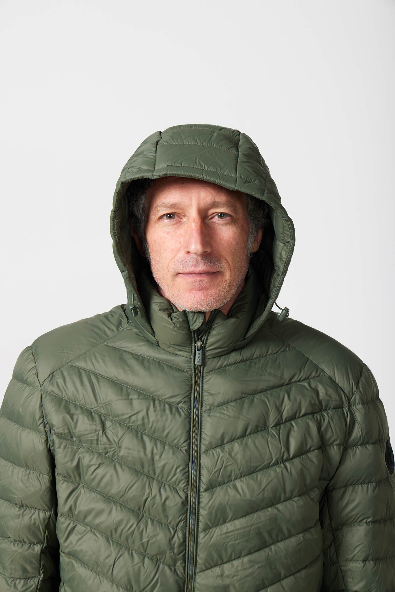 Men’s Sage Classic Jacket™ in green, lightweight hooded puffer jacket designed for versatile everyday wear in Australia