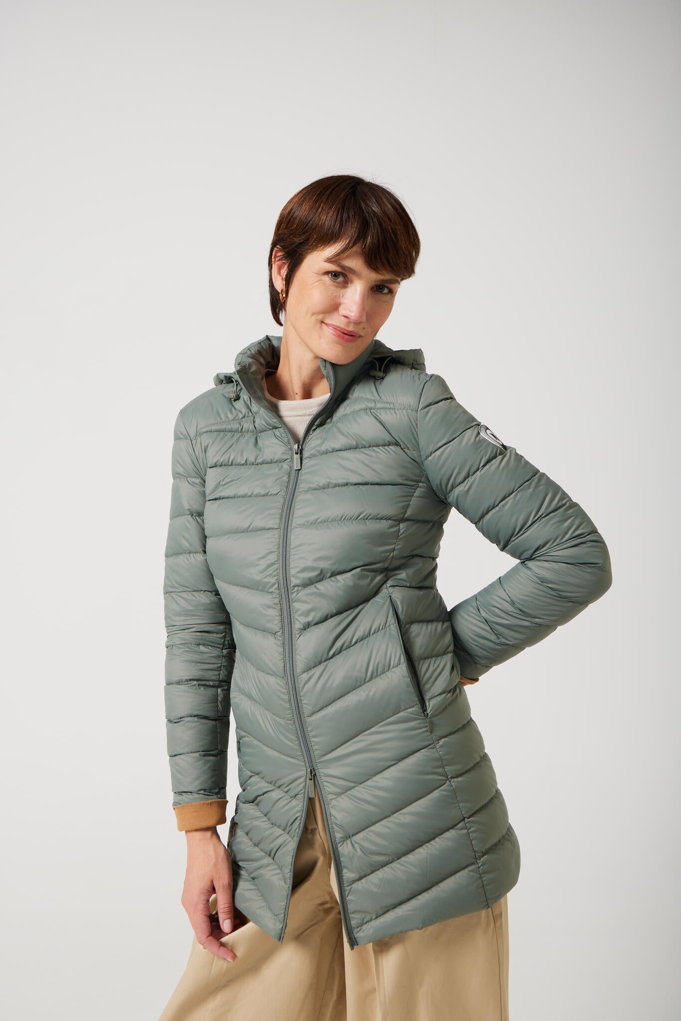 Women’s sage green insulated hooded parka, warm winter parka perfect for layering in Australia’s cooler weather — Sage Classic Parka™