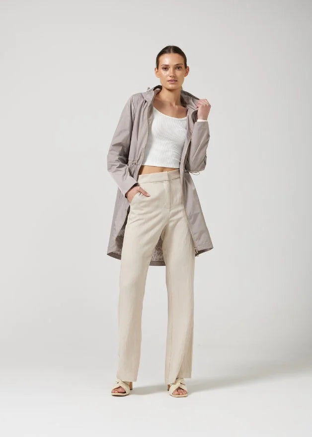 The Cairo Sands beige hooded raincoat, modern lightweight waterproof raincoat perfect for Australia’s weather and rain