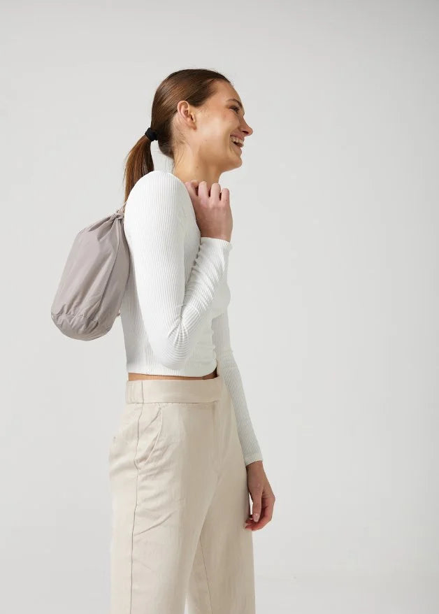 The Cairo Sands beige hooded raincoat, modern lightweight waterproof raincoat perfect for Australia’s weather and rain